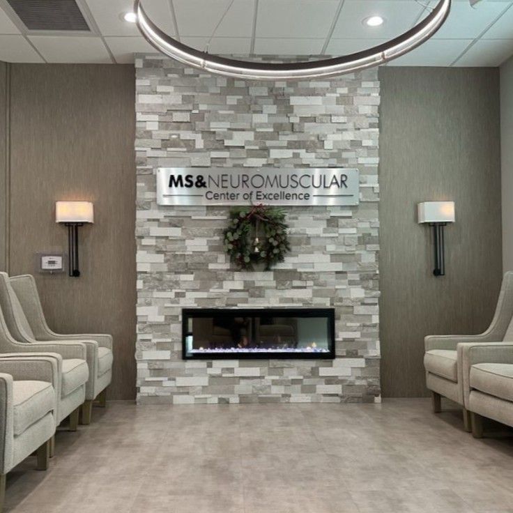 Commercial Doctor Office lobby space with fireplace Tampa Bay Area-Lela Williams Interior Design.png