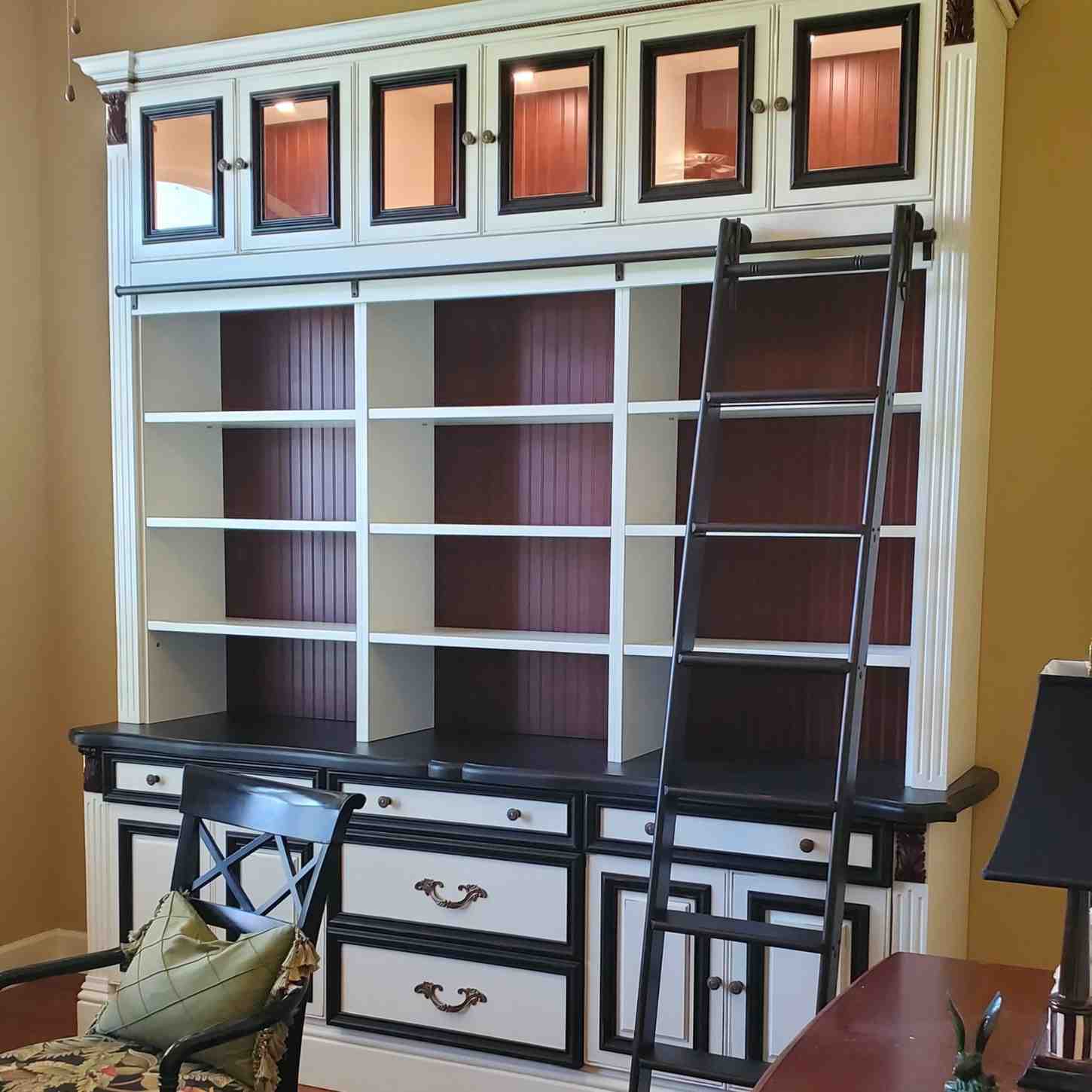 Custom Cabinets, Build to suit, Lighted display, Space planning, sliding ladder, Clearwater Beach - Lela Williams Interior Design.jpg